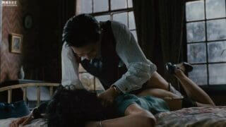 An elegant chinese woman raped roughly on a bed